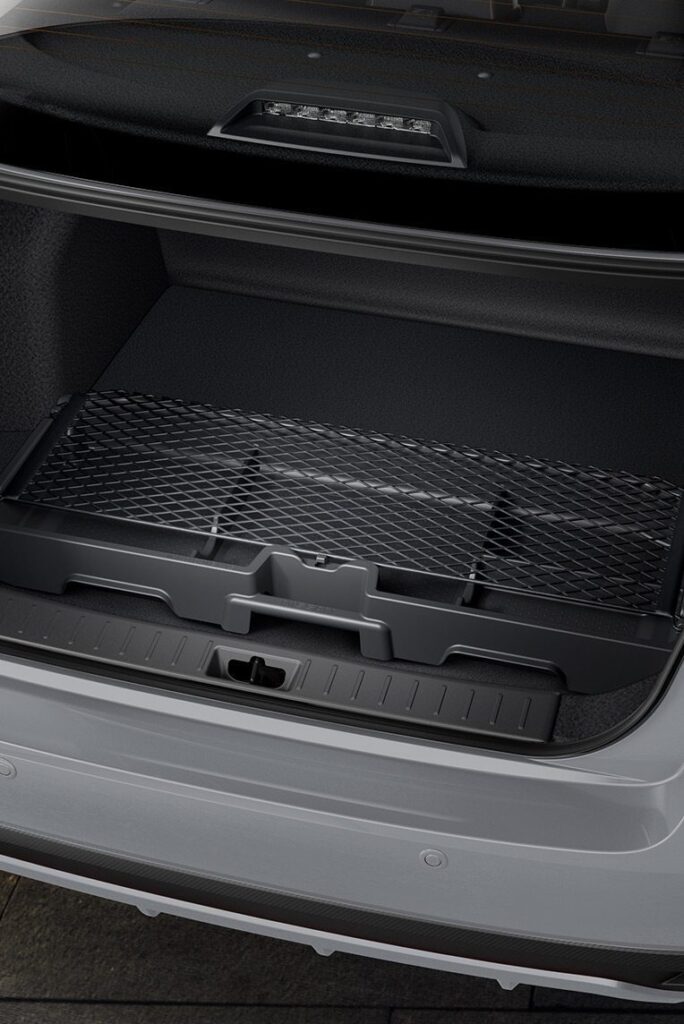 nissan 2024 versa exclusive cvt gris lunar gris interior organizador cajuela d.jpg.ximg .l 12 h.smart  684x1024